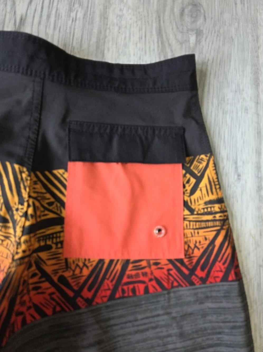 Ron Jon Black, Orange and Red Tribal Board Shorts